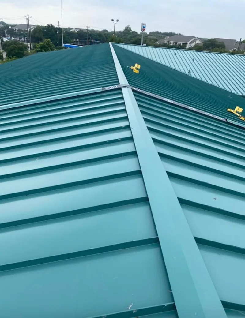 Green commercial metal roof ridge and valley for Metal Roof Repair in Eagan